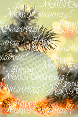 Words Christmas and New Year Holiday greeting card. Beautiful ball, pine branches and a garland in the snow.