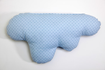 Colorful and pompom pillow. pillow with dot pattern and on white background.