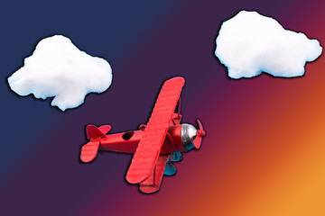 Toy airplane in sky