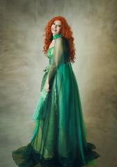 Woman in green fantasy dress