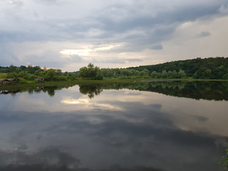 Landscape with lake and clouds