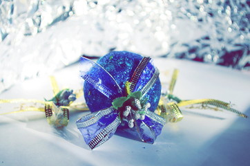 Blue Christmas toy on the silver background