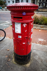 Fototapeta na wymiar red post box oxford road Manchester university campus