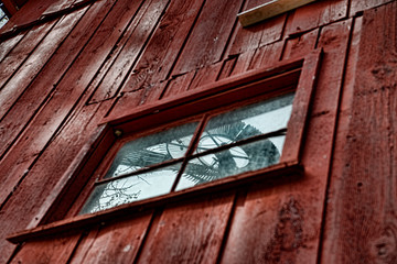 Windmill Reflected in Barn Window