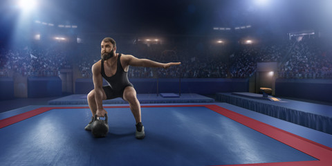 Fototapeta na wymiar Male athlete prepares to lift a weight on a professional stadium. Stadium and crowd are made in 3d.