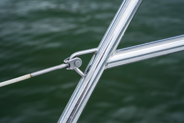 Detail of railing and bowsprit on yacht boat