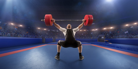 Male athlete squats with a barbell on a professional stadium. Stadium and crowd are made in 3d.