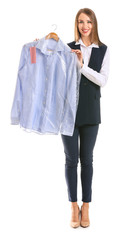 Female worker of modern dry-cleaner's with clothes on white background