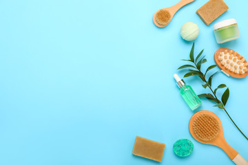 Cosmetics and accessories for bath on color background