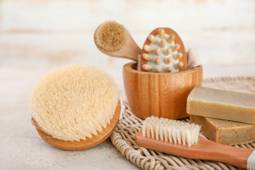 Brushes and soap for bath on table