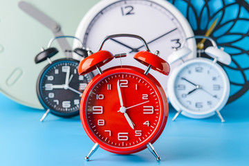 Many different clocks on table