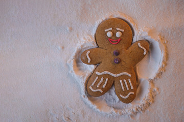 Happy New Year: ginger little man lies on the ground and with the help of his hands and feet makes...