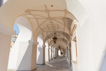 Old renaissance or mannerist arcades of tenement house in Zamosc Poland,  example of Lublin renaissance, renesans lubelski, ceiling covered with stucco mannerist ornaments - obrazy, fototapety, plakaty