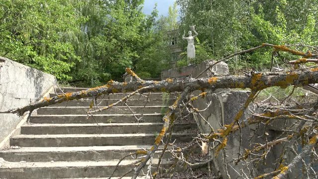 Gaydary village, Kharkov region, Ukraine - 11th of August 2019: 4K Visit to the Former Soviet Pioneer camp - Statue and stairs on the territory of the former camp
