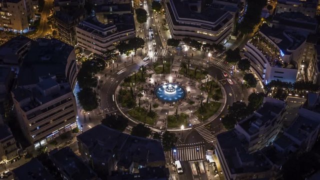 Big roundabout - Aerial hyperlapse - Dizengoff square in tel Aviv, Israel, at night, 4k drone view
