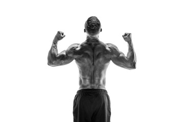 Fototapeta na wymiar Tattooed Bodybuilder showing his back and biceps muscles isolated on a white background, personal fitness trainer. Strong man flexing his muscles