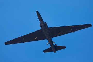 The unmistakable profile of a U-2 Dragon Lady  , against the  sky