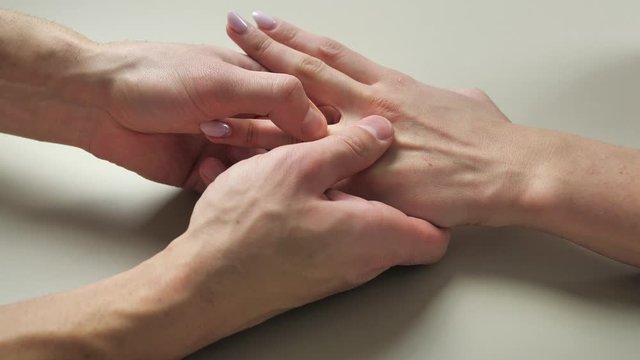 man removes the ring to woman. 4k