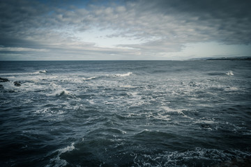Stormy sea in Dunbar, a seaside town in Scotland, UK - 306603925