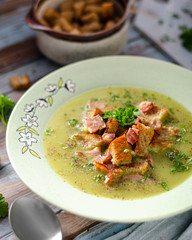 Organic peas soup with crumbs