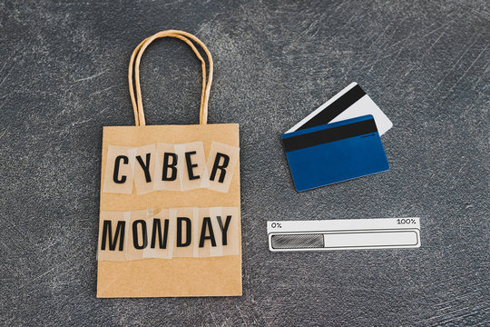 cyber monday shopping bag with payment cards and progress bar loading