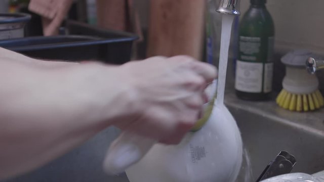 Washing Dish Dishes At Sink Slow Motion