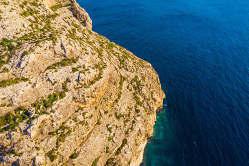 Cliffs and blue sea. Blue grotto. Winter. Malta island