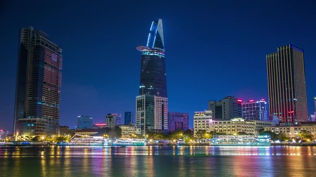 Ho Chi Minh City landmark skyscrapers along Saigon river, Vietnam time lapse