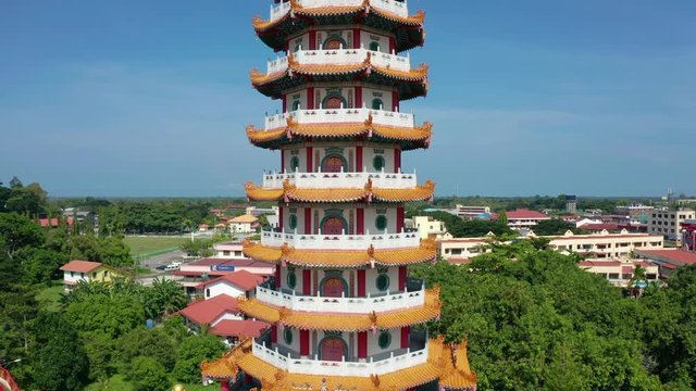 4K Aerial footage of beautiful nature rural with Chinese Pagoda Ling San, Tuaran,Sabah. Landscape view during sunny day