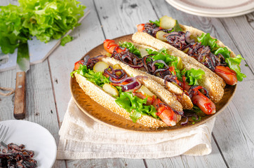 Hot dog with red onion