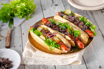 Hot dog with red onion