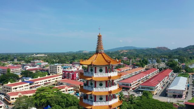4K Aerial footage of beautiful nature rural with Chinese Pagoda Ling San, Tuaran,Sabah. Landscape view during sunny day