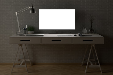 Bright computer monitor at night in the studio or at home workplace. Clipping path around display. 3d illustration