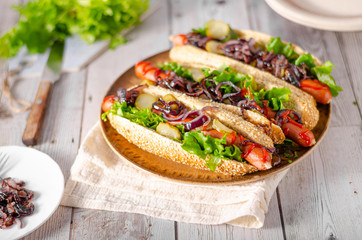Hot dog with red onion