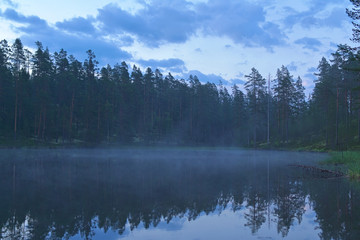 Obraz premium Beautiful misty lake in Finland
