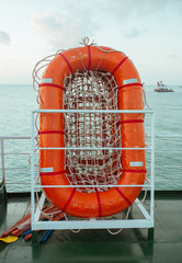 Rescue boat, raft on the roof of a ferry in Asia