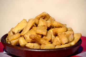 Plate of fried cassava sticks yucca