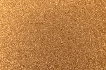 Shiny yellow metallic gold leaf foil texture background