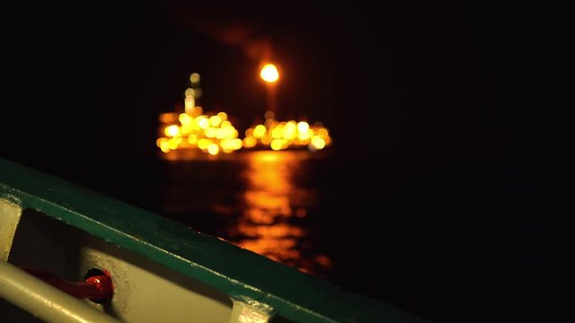 FPSO tanker vessel near Oil platform Rig. Offshore oil and gas industry, sea oil production and storage