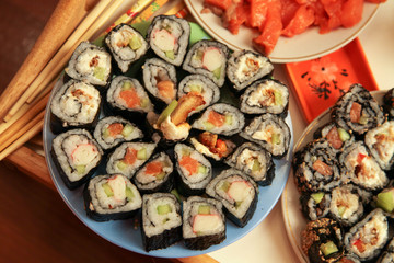 table with a set of rolls and sauce