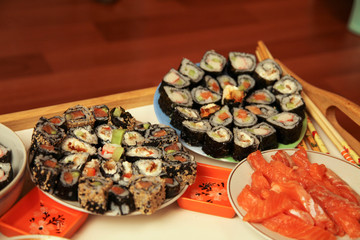 table with a set of rolls and sauce