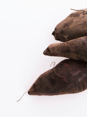 Fresh Yacon roots on white background