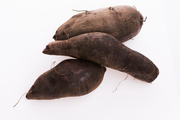 Fresh Yacon roots on white background