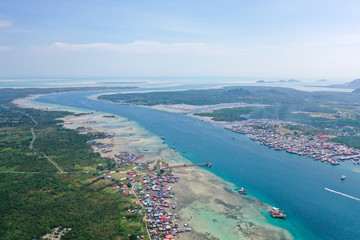 Aerial view partial part of Semporna island with blue ocean and coral reef in Malaysia, Borneo.