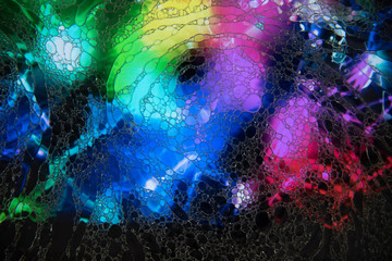 Mixing water and oil to form beautiful colorful abstract backgrounds 