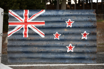 New Zealand flag painted on corrugated iron