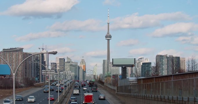 Cars driving to and from Toronto on the expressway