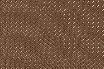 Pale brown leather background with imitation weave texture. Glossy dermantine, artificial leather structure.