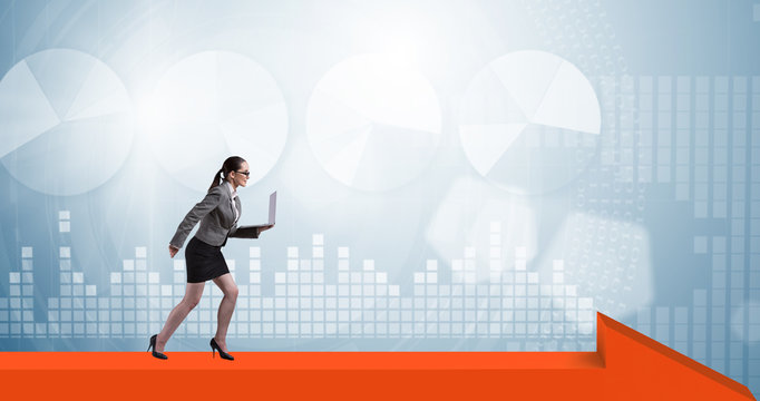 The businesswoman walking on arrow sign