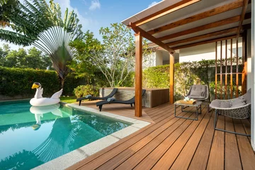 Foto op Plexiglas Swimming pool in tropical garden pool villa feature floating balloon © Stock PK